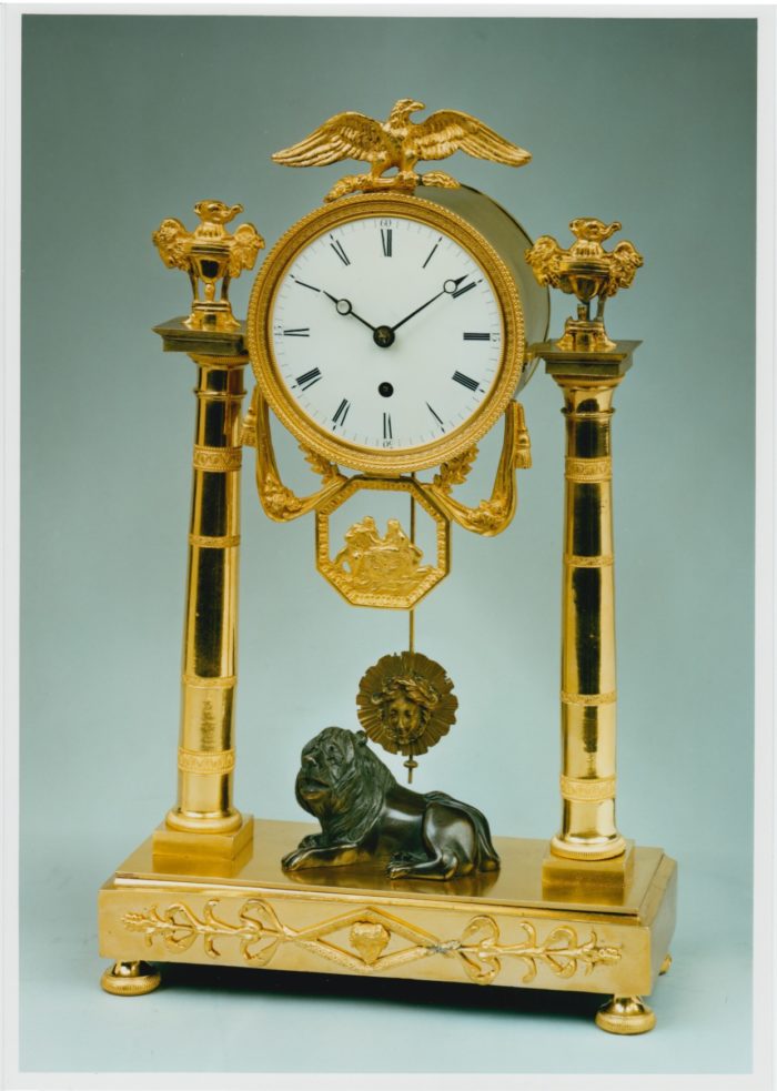Mantel clock with bronze lion by Baetens, London. Raffety Ltd.