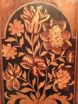 Marquetry panel of tulips and flowers on a longcase clock by Thomas Harris, London. Circa 1690