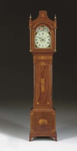 A Mahogany and Marquetry Longcase Clock by Isaac Brokaw, Bridge Town, circa 1790-1810. Photo copyright Christie’s (2006).