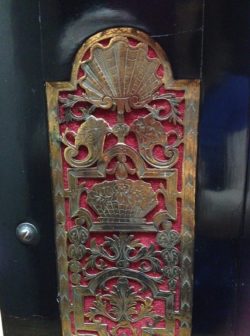 A detail of engraved brass side panels on a bracket clock – come and find it at the fair! Raffety Ltd.