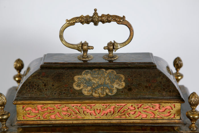 Detail of the caddy top of the clock by Simon du Charmes. Raffety Ltd.