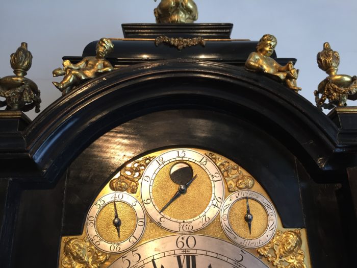 Detail of the subsidiary dials and moonphase in the arch on a bracket clock by Charles Cabrier II. Circa 1730. Raffety Ltd
