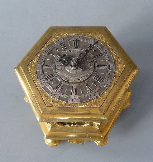 Silver & gilt hexagonal table clock signed Cabrier, London. Circa 1760. Courtesy Van Dreven Aniquair.